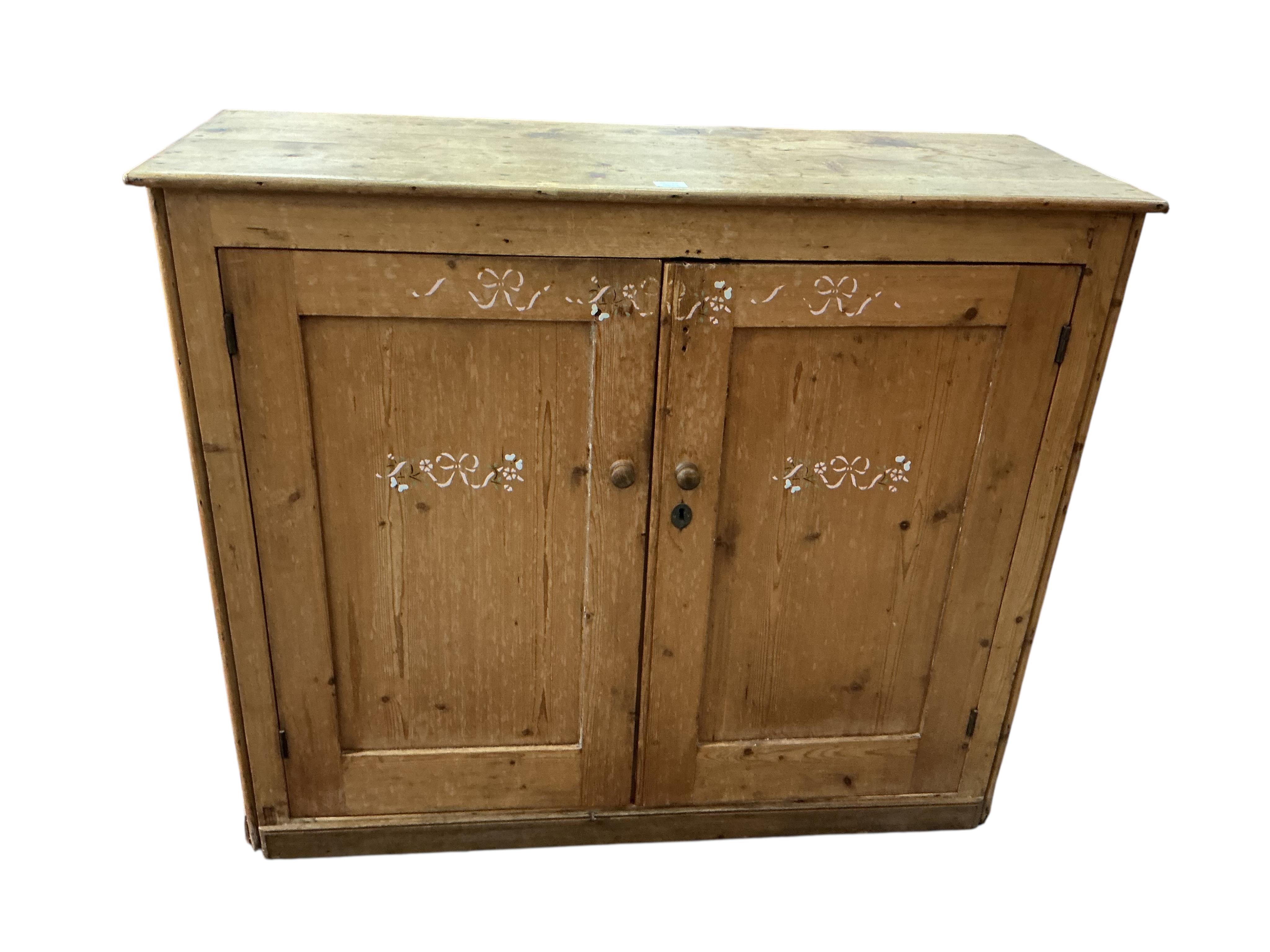 A Victorian pine side cabinet, width 131cm, depth 49cm, height 111cm
